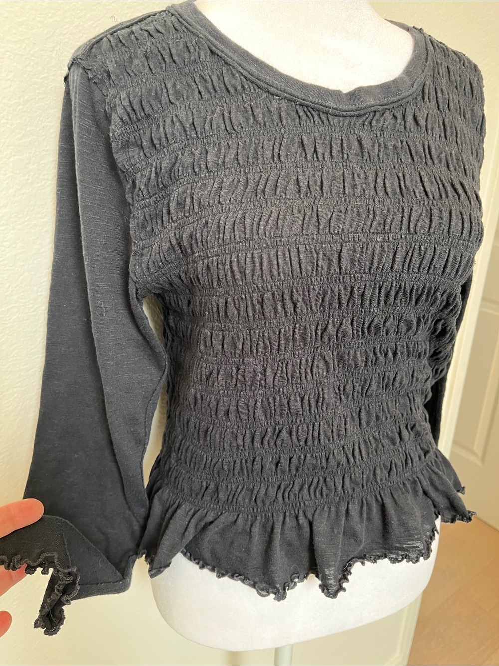We The Free Black Smocked Long Sleeve Ruffle Hem Top